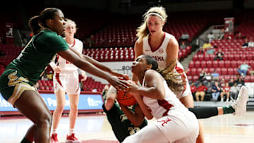 Alabama guard Jessica Timmons (23) fights for a ball on the floor by South Florida forward Daniela Gonzalez (20) and South Florida forward Romi Levy (23) Thursday, Nov. 16, 2023, at Coleman Coliseum.