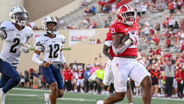 Aug 31, 2024; Bloomington, Indiana, USA;  Indiana Hoosiers running back Elijah Green (21) runs for a touchdown against the Florida International Panthers during the second half at Memorial Stadium. Mandatory Credit: Robert Goddin-USA TODAY Sports