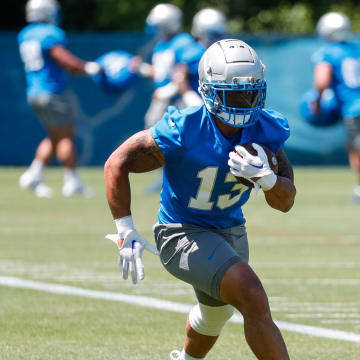 Detroit Lions running back Craig Reynolds (13) practices during OTAs at Detroit Lions headquarters and training facility in Allen Park on Thursday, May 30, 2024.