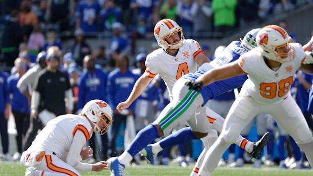 Tampa Bay Buccaneers kicker Chase McLaughlin (4) follows through on a made field goal against the Seattle Seahawks. 