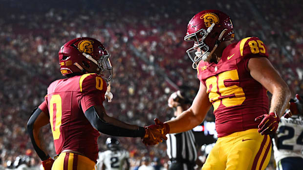 Trumain Carroll USC Trojans Big Ten Football Strength and Conditioning Coach Tight End Walker Lyons College Football 