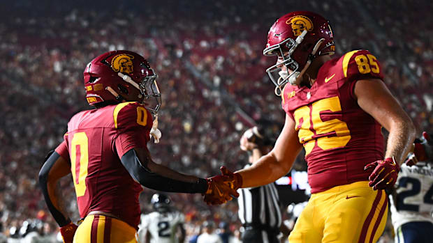 Sep 7, 2024; Los Angeles, California, USA; USC Trojans running back Quinten Joyner (0) celebrates with tight end Walker Lyons