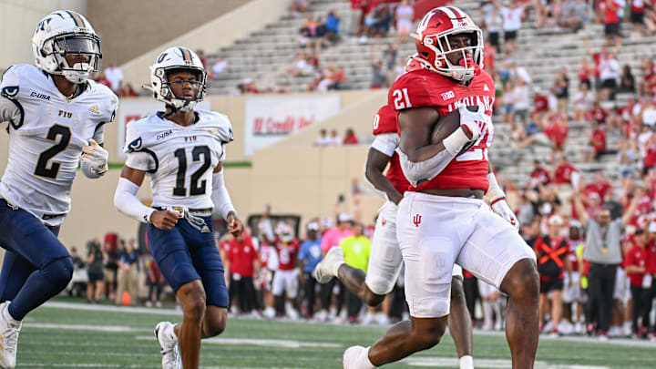 Aug 31, 2024; Bloomington, Indiana, USA;  Indiana Hoosiers running back Elijah Green (21) runs for a touchdown against the Florida International Panthers during the second half at Memorial Stadium. Mandatory Credit: Robert Goddin-USA TODAY Sports