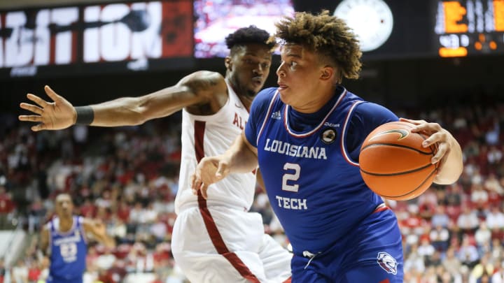 Louisiana Tech basketball player Kenneth Lofton (2) looks to lead the Bulldogs to a Conference USA win over Charlotte on Thursday night.