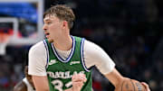 Oct 26, 2025; Dallas, Texas, USA; Dallas Mavericks forward Cooper Flagg (32) moves the ball to the basket against the Toronto Raptors during the second half at the American Airlines Center. Mandatory Credit: Jerome Miron-Imagn Images