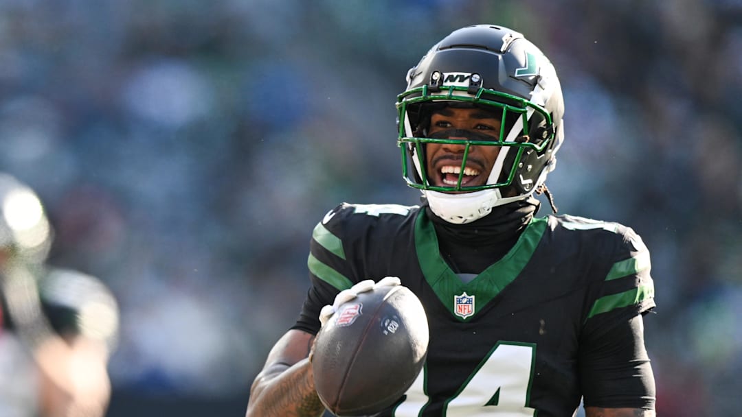 Dec 1, 2024; East Rutherford, New Jersey, USA; New York Jets wide receiver Malachi Corley (14) celebrates after a play during the first quarter against the Seattle Seahawks at MetLife Stadium. Mandatory Credit: Mark Smith-Imagn Images