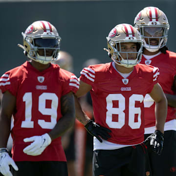 Jun 10, 2025; Santa Clara, CA, USA; San Francisco 49ers wide receivers Jacob Cowing (19), Junior Bergen (86), Malik Knowles (3) and Isaiah Neyor (14) queue up for a passing drill during an OTA at Levi's Stadium. Mandatory Credit: D. Ross Cameron-Imagn Images