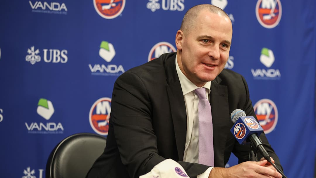 Nov 22, 2025; Elmont, New York, USA; New York Islanders General Manager Mathieu Darche speaks with fans at a pre-game event prior to the game against the St. Louis Blues at UBS Arena. Mandatory Credit: Wendell Cruz-Imagn Images
