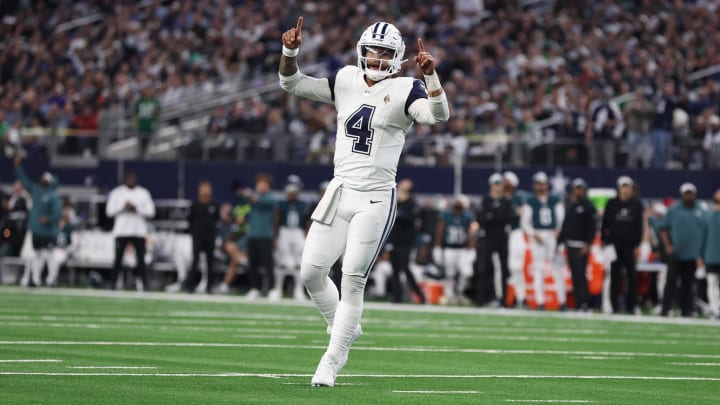 Dec 10, 2023; Arlington, Texas, USA; Dallas Cowboys quarterback Dak Prescott (4) celebrates a touchdown in the second quarter against the Philadelphia Eagles at AT&T Stadium. Mandatory Credit: Tim Heitman-USA TODAY Sports