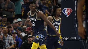 May 3, 2022; Memphis, Tennessee, USA; Memphis Grizzlies forward Jaren Jackson Jr. (13) and Memphis Grizzlies guard Ja Morant (12) react during the first half in game two of the second round for the 2022 NBA playoffs against the Golden State Warriors at FedExForum. Mandatory Credit: Petre Thomas-USA TODAY Sports