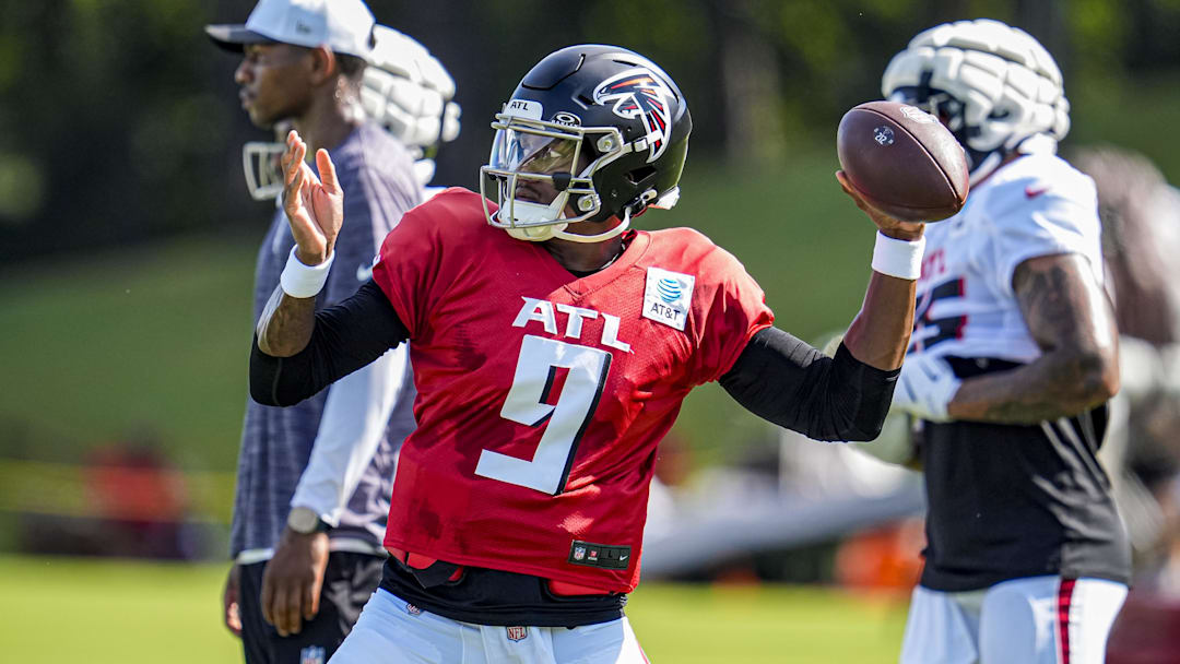 Jul 29, 2025; Atlanta, GA, USA; Atlanta Falcons quarterback Michael Penix Jr. (9) passes on the field during practice at training camp at IBM Performance Field. Mandatory Credit: Dale Zanine-Imagn Images