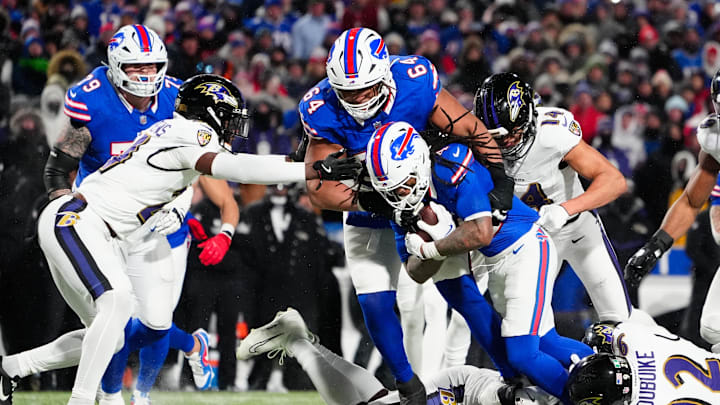Buffalo Bills running back James Cook (4) runs the ball during the fourth quarter against the Baltimore Ravens