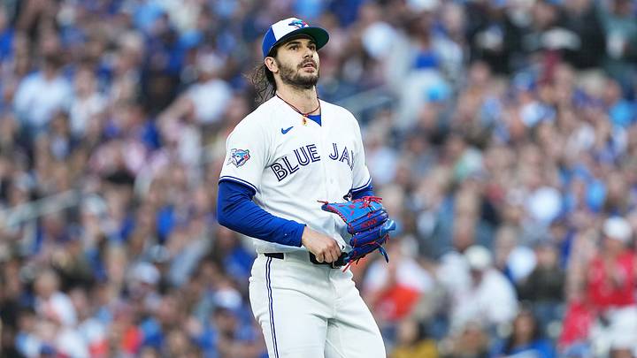 Jun 22, 2026; Toronto, Ontario, CAN; Toronto Blue Jays starting pitcher Dylan Cease (84) walks towards the dugout against the Houston Astros during the first inning at Rogers Centre. Mandatory Credit: Nick Turchiaro-Imagn Images