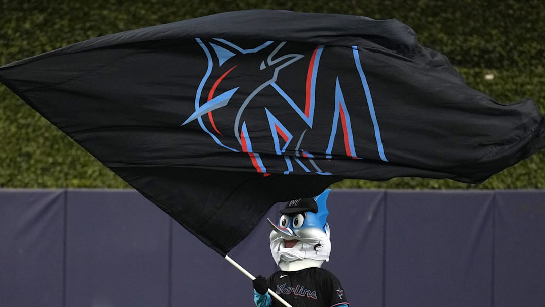 Miami Marlins mascot waves a flag