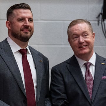 Florida State University’s new men’s basketball coach Luke Loucks stands with FSU Athletic Director Michael Alford before a press conference Monday, March 10, 2025.