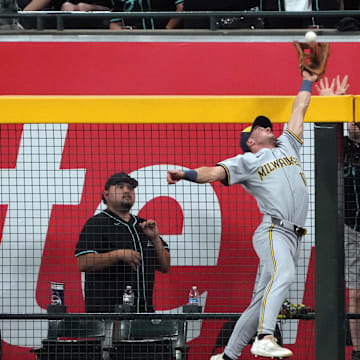 Sep 14, 2024; Phoenix, Arizona, USA; Milwaukee Brewers outfielder Sal Frelick (10) makes a catch for an out against the Arizona Diamondbacks in the first inning at Chase Field. Mandatory Credit: Rick Scuteri-Imagn Images