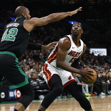 May 1, 2024; Boston, Massachusetts, USA; Miami Heat center Bam Adebayo (13) looks for a way around Boston Celtics center Al Horford (42) during the first quarter of game five of the first round of the 2024 NBA playoffs at TD Garden. Mandatory Credit: Winslow Townson-USA TODAY Sports