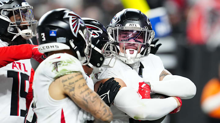 Dec 16, 2024; Paradise, Nevada, USA; Atlanta Falcons safety Justin Simmons (31) celebrates with teammates after intercepting a Las Vegas Raiders pass during the fourth quarter at Allegiant Stadium. Mandatory Credit: Stephen R. Sylvanie-Imagn Images