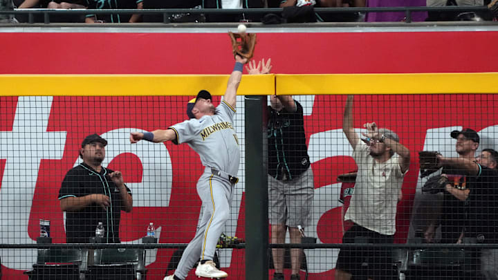 Sep 14, 2024; Phoenix, Arizona, USA; Milwaukee Brewers outfielder Sal Frelick (10) makes a catch for an out against the Arizona Diamondbacks in the first inning at Chase Field. Mandatory Credit: Rick Scuteri-Imagn Images