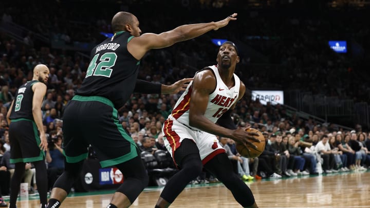 May 1, 2024; Boston, Massachusetts, USA; Miami Heat center Bam Adebayo (13) looks for a way around Boston Celtics center Al Horford (42) during the first quarter of game five of the first round of the 2024 NBA playoffs at TD Garden. Mandatory Credit: Winslow Townson-USA TODAY Sports