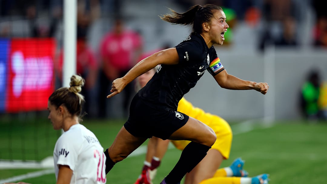 Angel City FC's Ali Riley celebrates in a match against San Diego Wave FC