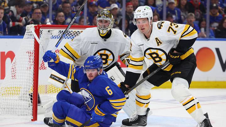 Apr 19, 2026; Buffalo, New York, USA; Boston Bruins defenseman Charlie McAvoy (73) knocks down Buffalo Sabres left wing Zach Benson (6) in front of the net as Boston Bruins goaltender Jeremy Swayman (1) watches the puck during the second period in game one of the first round of the 2026 Stanley Cup Playoffs at KeyBank Center. Mandatory Credit: Timothy T. Ludwig-Imagn Images Apr 19, 2026; Buffalo, New York, USA; Boston Bruins defenseman Charlie McAvoy (73) knocks down Buffalo Sabres left wing Zach Benson (6) in front of the net as Boston Bruins goaltender Jeremy Swayman (1) watches the puck during the second period in game one of the first round of the 2026 Stanley Cup Playoffs at KeyBank Center. Mandatory Credit: Timothy T. Ludwig-Imagn Images