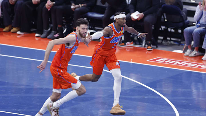 Chet Holmgren and Shai Gilgeous-Alexander celebrate another winning play. 