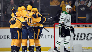 Dec 23, 2023; Nashville, Tennessee, USA; Nashville Predators players celebrate after a goal by Nashville Predators center Colton Sissons (10) during the second period against the Dallas Stars at Bridgestone Arena. Mandatory Credit: Christopher Hanewinckel-USA TODAY Sports