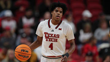 Texas Tech Red Raiders guard Christian Anderson (4) with the ball in the first half against the Wyoming Cowboys at United Supermarkets Arena.