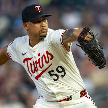 Jul 9, 2025; Minneapolis, Minnesota, USA; Minnesota Twins relief pitcher Jhoan Duran (59) delivers a pitch against the Chicago Cubs in the ninth inning at Target Field.