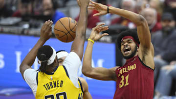 Apr 12, 2024; Cleveland, Ohio, USA; Cleveland Cavaliers center Jarrett Allen (31) loses the ball beside Indiana Pacers center Myles Turner (33) in the first quarter at Rocket Mortgage FieldHouse. Mandatory Credit: David Richard-Imagn Images