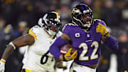 Jan 11, 2025; Baltimore, Maryland, USA; Baltimore Ravens running back Derrick Henry (22) runs to score a touchdown against the Pittsburgh Steelers in the third quarter in an AFC wild card game at M&T Bank Stadium. Mandatory Credit: Mitch Stringer-Imagn Images