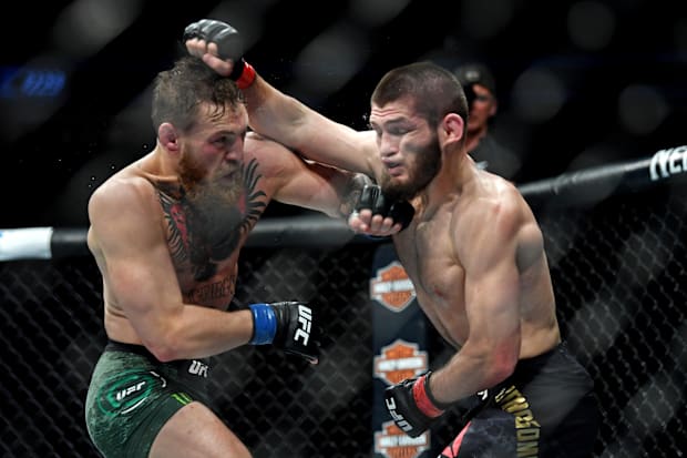 Khabib Nurmagomedov (red gloves) fights Conor McGregor (blue gloves) during UFC 229 at T-Mobile Arena. 