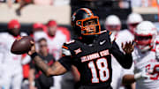 Oklahoma State Cowboys quarterback Sam Jackson V (18) throws a pass during a college football game between the Oklahoma State Cowboys (OSU) and the Houston Cougars at Boone Pickens Stadium in Stillwater, Okla., Saturday, Oct. 11, 2025. Houston won 39-17.