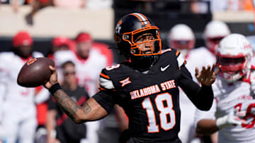 Oklahoma State Cowboys quarterback Sam Jackson V (18) throws a pass during a college football game between the Oklahoma State Cowboys (OSU) and the Houston Cougars at Boone Pickens Stadium in Stillwater, Okla., Saturday, Oct. 11, 2025. Houston won 39-17.