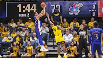 Jan 7, 2023; Morgantown, West Virginia, USA; Kansas Jayhawks guard Kevin McCullar Jr. (15) 