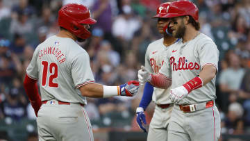 Jun 24, 2024; Detroit, Michigan, USA;  Philadelphia Phillies first baseman Bryce Harper (3) receives congratulations from designated hitter Kyle Schwarber (12) after he hits a three-run home run in the sixth inning against the Detroit Tigers at Comerica Park. Mandatory Credit: Rick Osentoski-USA TODAY Sports