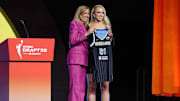 Hailey Van Lith poses with WNBA commissioner Cathy Engelbert after being selected with the number eleven overall pick to the Chicago Sky in the 2025 WNBA Draft at The Shed at Hudson Yards.