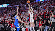 Jan 7, 2025; Athens, Georgia, USA; Georgia Bulldogs guard Dakota Leffew (1) shoots over Kentucky Wildcats guard Koby Brea (4) during the first half at Stegeman Coliseum. Mandatory Credit: Dale Zanine-Imagn Images