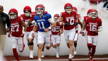 Oklahoma's Jackson Arnold (11) takes the field with teammates before a University of Oklahoma (OU) Sooners spring football game at Gaylord Family-Oklahoma Memorial Stadium in Norman, Okla., Saturday, April 20, 2024.