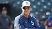 Aug 26, 2025; Seattle, Washington, USA; Seattle Mariners manager Dan Wilson (6) observes batting practice before a game against the San Diego Padres at T-Mobile Park. Mandatory Credit: Joe Nicholson-Imagn Images