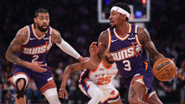 Apr 6, 2025; New York, New York, USA; Phoenix Suns guard Bradley Beal (3) dribbles as New York Knicks forward Mikal Bridges (25) is screened by Phoenix Suns center Nick Richards (2) during the first half at Madison Square Garden. Mandatory Credit: Vincent Carchietta-Imagn Images