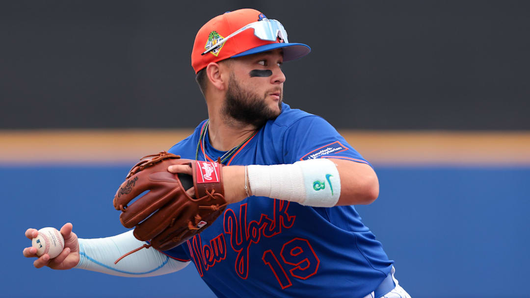 Feb 21, 2026; Port St. Lucie, Florida, USA; New York Mets third baseman Bo Bichette (19) throws to first base but cannot retire Miami Marlins third baseman Connor Norby (not pictured) during the fourth inning at Clover Park. Mandatory Credit: Sam Navarro-Imagn Images