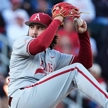 Arkansas pitcher Zach Root (33) looks to throw during a NCAA baseball game against Georgia in Athens, Ga., on Friday, April 11, 2025.