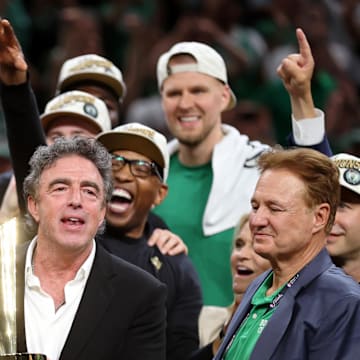 Jun 17, 2024; Boston, Massachusetts, USA; Boston Celtics owner Wyc Grousbeck holds the trophy after winning the 2024 NBA Finals against the Dallas Mavericks at TD Garden. Mandatory Credit: Peter Casey-Imagn Images