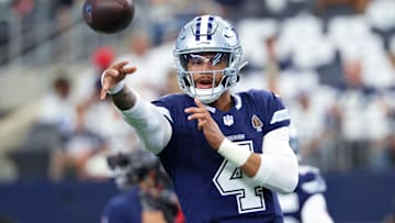 Oct 13, 2024; Arlington, Texas, USA; Dallas Cowboys quarterback Dak Prescott (4) warms up before the game against the Detroit Lions at AT&T Stadium. Mandatory Credit: Kevin Jairaj-Imagn Images