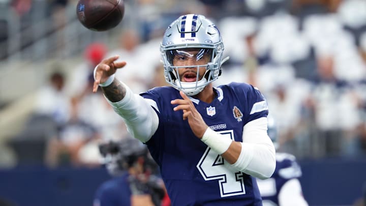 Oct 13, 2024; Arlington, Texas, USA; Dallas Cowboys quarterback Dak Prescott (4) warms up before the game against the Detroit Lions at AT&T Stadium. Mandatory Credit: Kevin Jairaj-Imagn Images