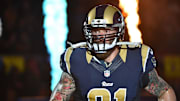 Sep 13, 2015; St. Louis, MO, USA; St. Louis Rams defensive end Chris Long (91) runs on to the field before the game between the St. Louis Rams and the Seattle Seahawks during the first half at the Edward Jones Dome. Mandatory Credit: Jasen Vinlove-Imagn Images