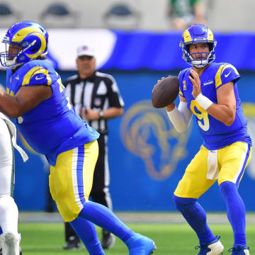 Oct 8, 2023; Inglewood, California, USA; Los Angeles Rams quarterback Matthew Stafford (9) drops back to pass against the Philadelphia Eagles during the first half at SoFi Stadium. Mandatory Credit: Gary A. Vasquez-USA TODAY Sports