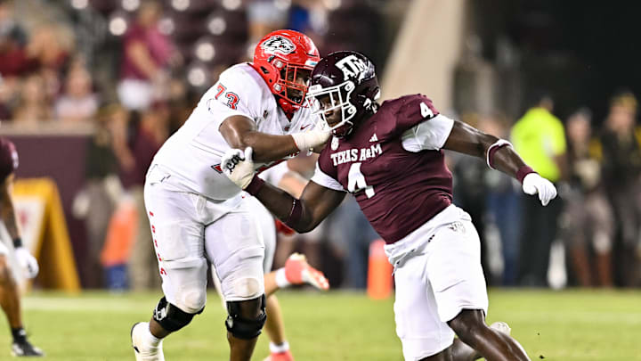 Sep 2, 2023; College Station, Texas, USA; Texas A&M Aggies defensive lineman Shemar Stewart (4) breaks past New Mexico Lobos offensive lineman Matthew Toilolo (74) during the fourth quarter at Kyle Field. Mandatory Credit: Maria Lysaker-Imagn Images